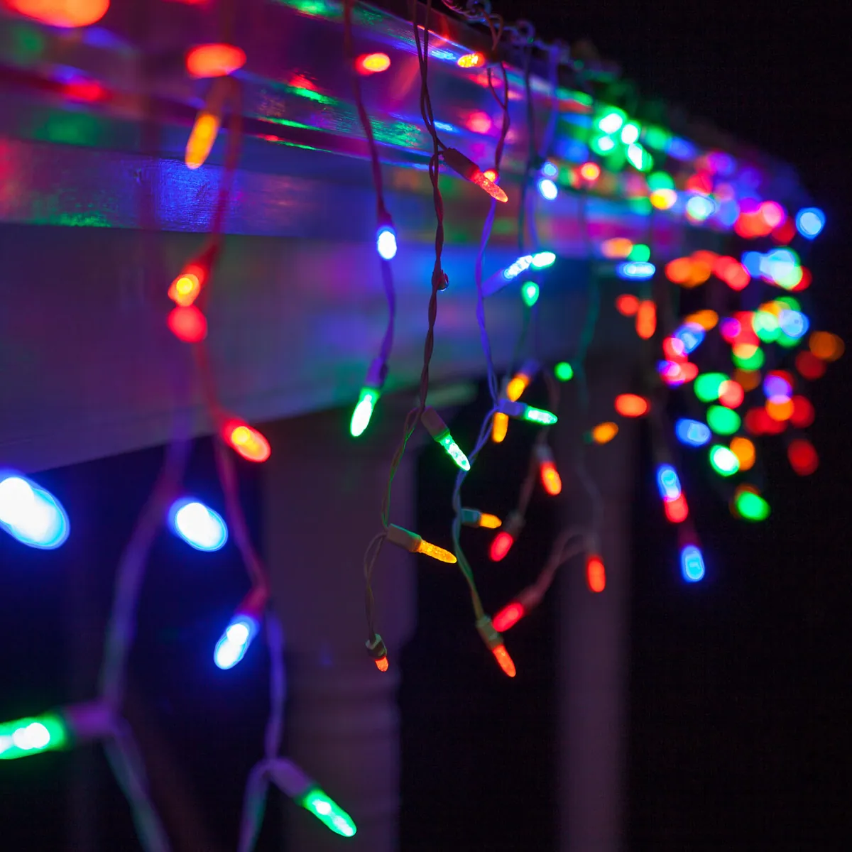 Multicolor M5 LED Icicle Lights on White Wire - Wintergreen Lighting® 20360