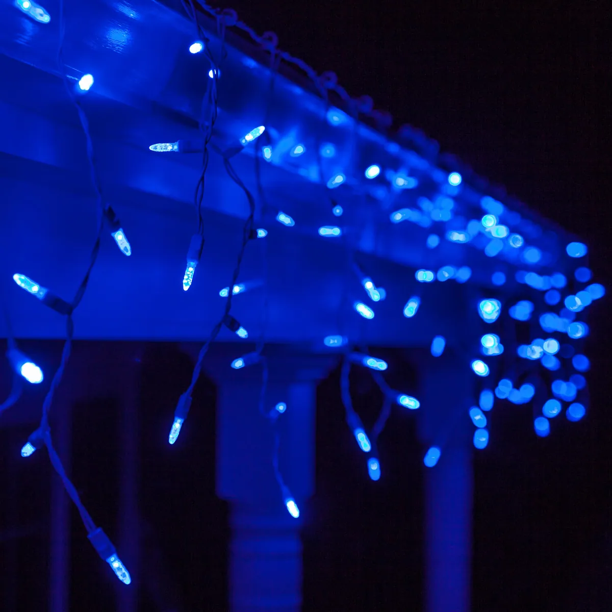 Blue M5 LED Icicle Lights on White Wire - Wintergreen Lighting® 85424