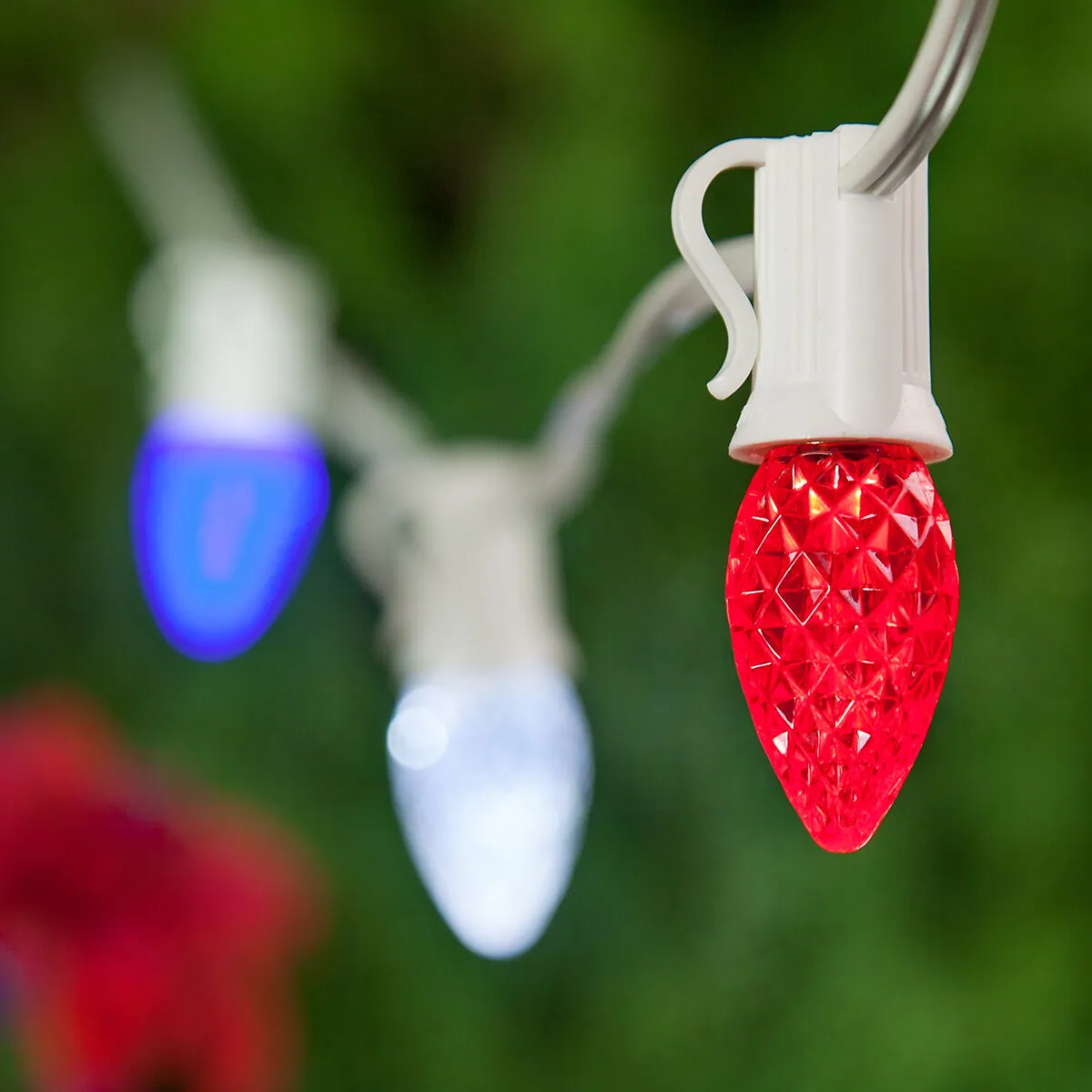 Red, White and Blue OptiCore LED Patio String Light Set with C7 E12 Bulbs on White Wire - Wintergreen Lighting® 79690