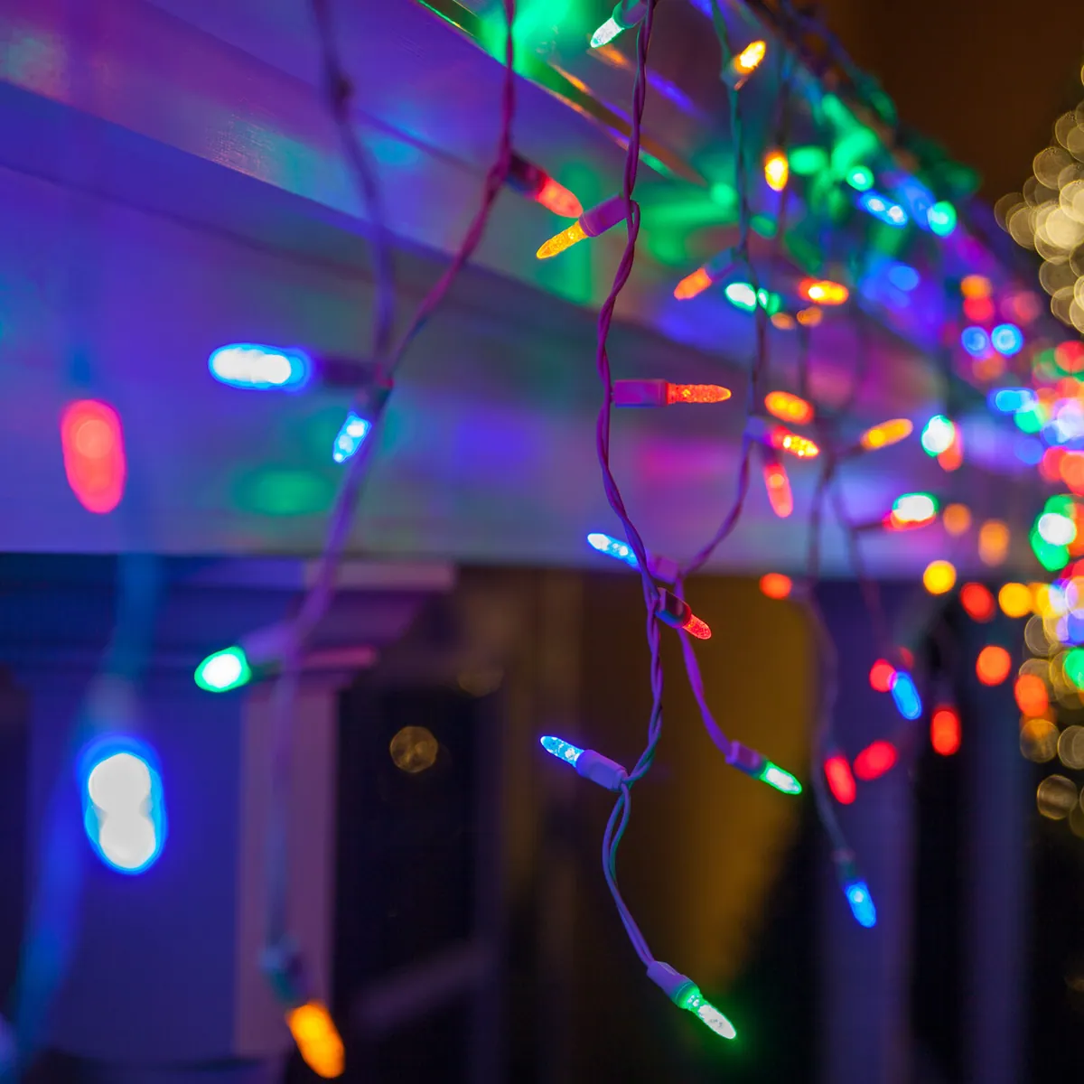 Multicolor M5 LED Color Change Icicle Lights on White Wire - Wintergreen Lighting® 85657